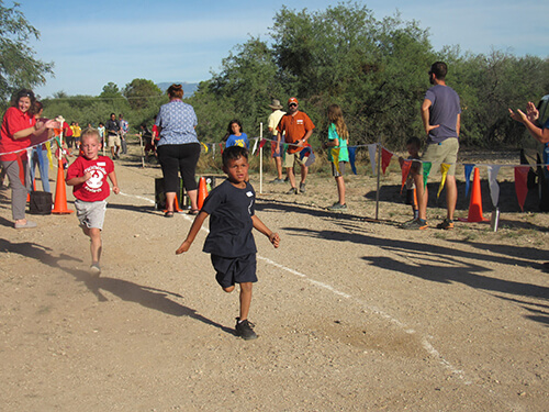 AmeriSchools Tucson Cross Country runners
